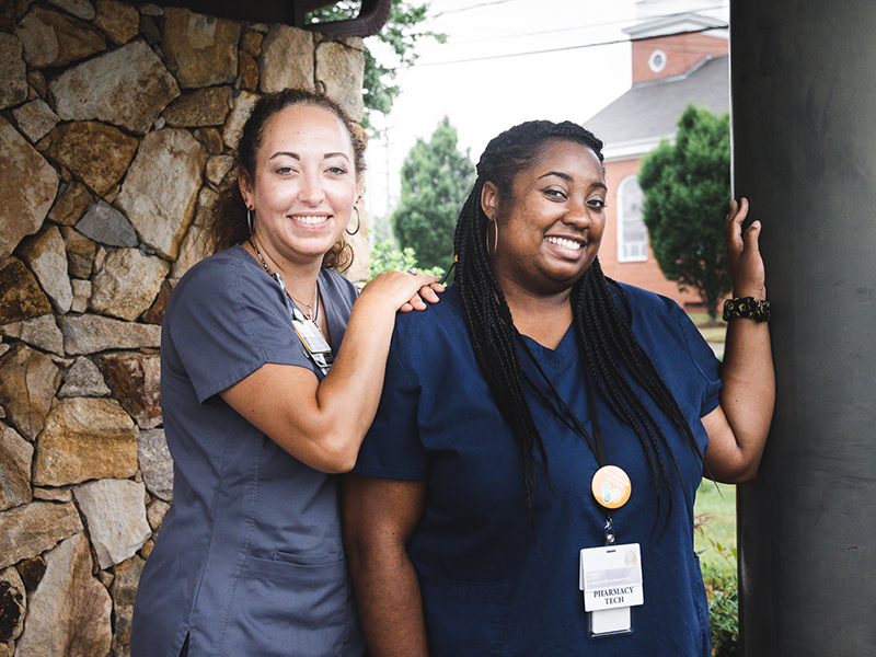 two female pharmacy technicians